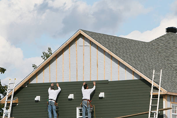 Professional Siding technician working in Churchville, MD